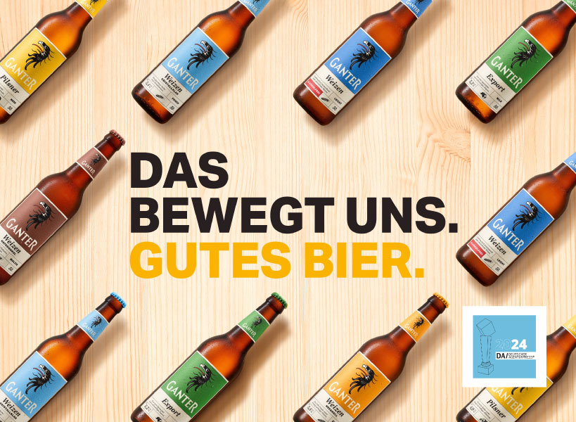 GANTER Brauerei Bierflaschen liegend auf Holzhintergrund