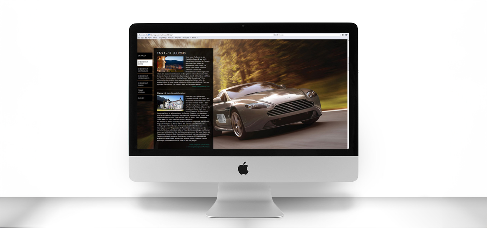 Ansicht der Website der 100 Jahre Aston Martin Europa Rally auf einem MacBook vor weißem Hintergrund