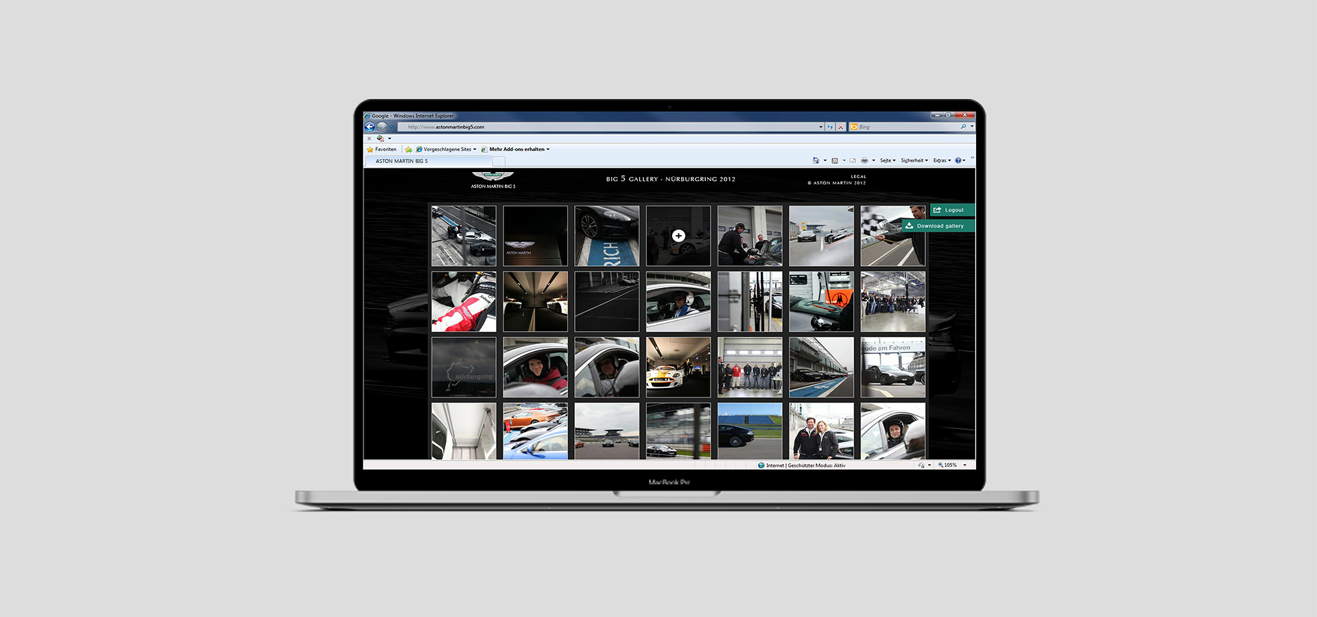 Ansicht der Website der Aston Martin Big 5 auf einem Notebook vor grauem Hintergrund